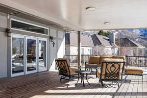 Wooden terrace with an outdoor hangout area