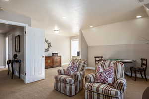 recreation area with visible vents, baseboards, vaulted ceiling, carpet flooring, and recessed lighting