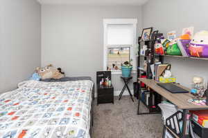 Bedroom featuring carpet flooring