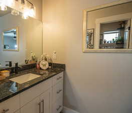 Primary Bathroom with vanity, and featuring split bathroom