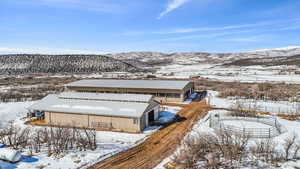 60’ Round pen, and turnout pens located near barn and arena