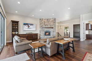 Living/Great room with custom stone fireplace, mantle, hearth and gas burning stone