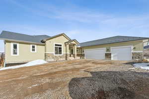 Home Entrance from the north east, 3 car garage