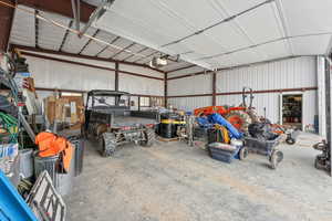 Workshop with three LiftMaster garage doors, and RV storage