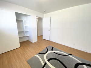 Interior space with light wood-style flooring and baseboards