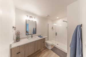 Master bath (3/4 bath) features a large walk-in shower. Upgraded countertops and cabinetry.