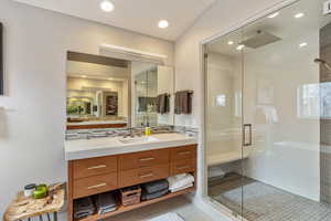 Bathroom with a stall shower, tasteful backsplash, recessed lighting, tile patterned flooring, and vanity