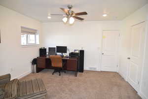 Bedroom #3 Home office/sitting room area, closets and main door into room.