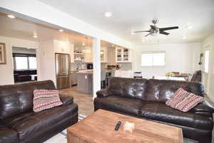 Open area showing convenience of the kitchen, dining area and great room in proximity to each other.