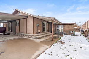 View of snow covered property