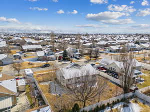 Birds eye view of property with a residential view