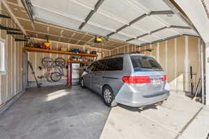 Garage featuring a garage door opener