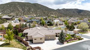 Drone / aerial view featuring a mountain view and a residential view