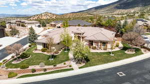 Birds eye view of property featuring a mountain view and a residential view