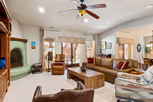 Living room with recessed lighting, a ceiling fan, visible vents, and light colored carpet