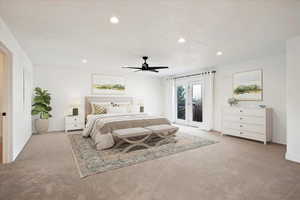 Bedroom with a textured ceiling, ceiling fan, access to outside, carpet flooring, and recessed lighting