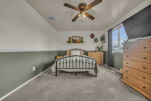 Bedroom featuring carpet, visible vents, ceiling fan, and baseboards