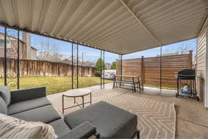 View of patio / terrace featuring fence