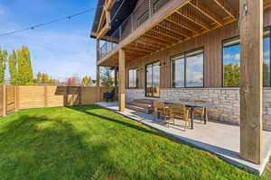 View of yard featuring a patio area and a fenced backyard