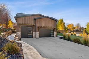 Garage with concrete driveway