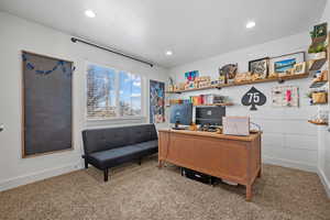 Carpeted office featuring recessed lighting and baseboards