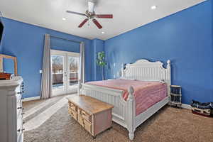 Carpeted bedroom with french doors, recessed lighting, a ceiling fan, access to outside, and baseboards
