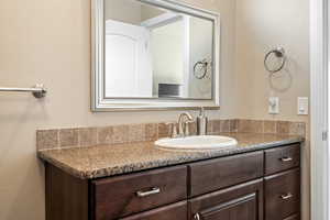 Bathroom featuring vanity