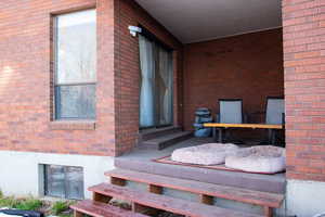 Covered patio off of Master bedroom with access to side yard.