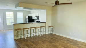 Living area with breakfast bar.