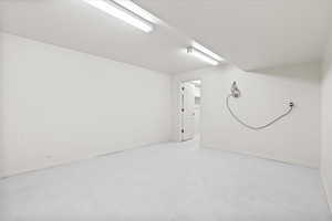 Storage room or gym room with walk in closet