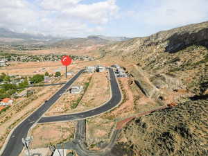 Birds eye view of property with a mountain view