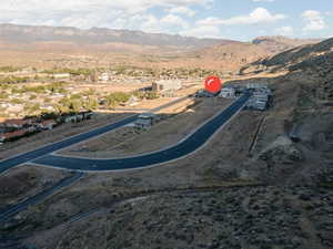 Birds eye view of property featuring a mountain view