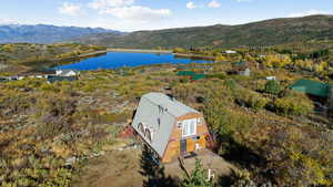 Aerial view with a water and mountain view