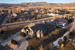 Aerial view featuring a mountain view and a residential view