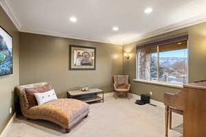 Sitting room featuring recessed lighting, baseboards, and carpet floors