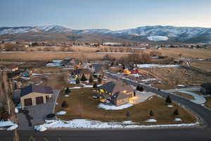 Birds eye view of property featuring a residential view and a mountain view