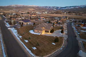 Drone / aerial view featuring a mountain view and a residential view