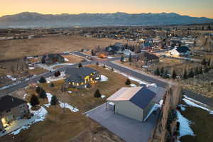 Aerial view at dusk with a mountain view and a residential view