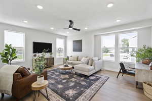Living room featuring recessed lighting, baseboards, and wood finished floors
