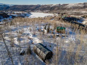 Snowy aerial view with a mountain view