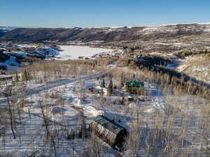 Snowy aerial view with a mountain view