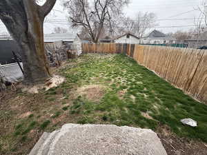 View of yard with fence