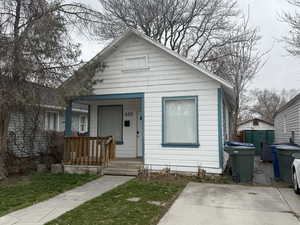 Bungalow featuring covered porch