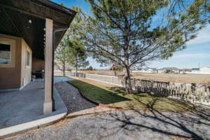 View of yard featuring a patio area and fence private yard