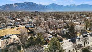 Birds eye view of property featuring a residential view and a mountain view