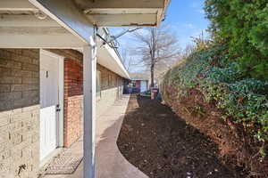 View of home's exterior with brick siding