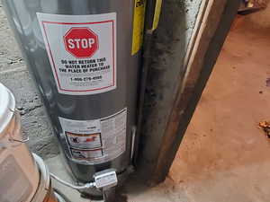 Utilities featuring gas water heater