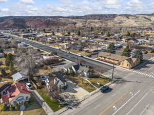 Birds eye view of property with a residential view and a mountain view