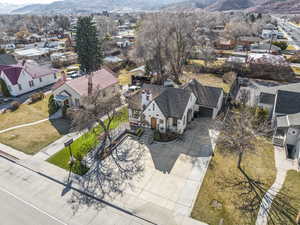 Birds eye view of property featuring a mountain view and a residential view