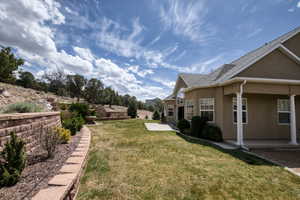 View of backyard with a patio